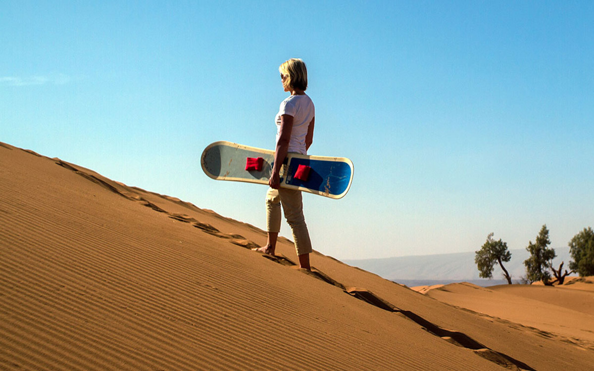 sand boarding in zagora desert tinfou erg lihoudi chigaga
